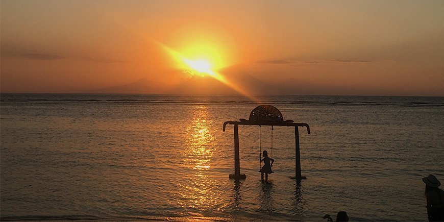 Solen går ned i horisonten på Gili Trawangan