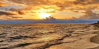 Magisk solnedgang på stranden i Varadero, Cuba